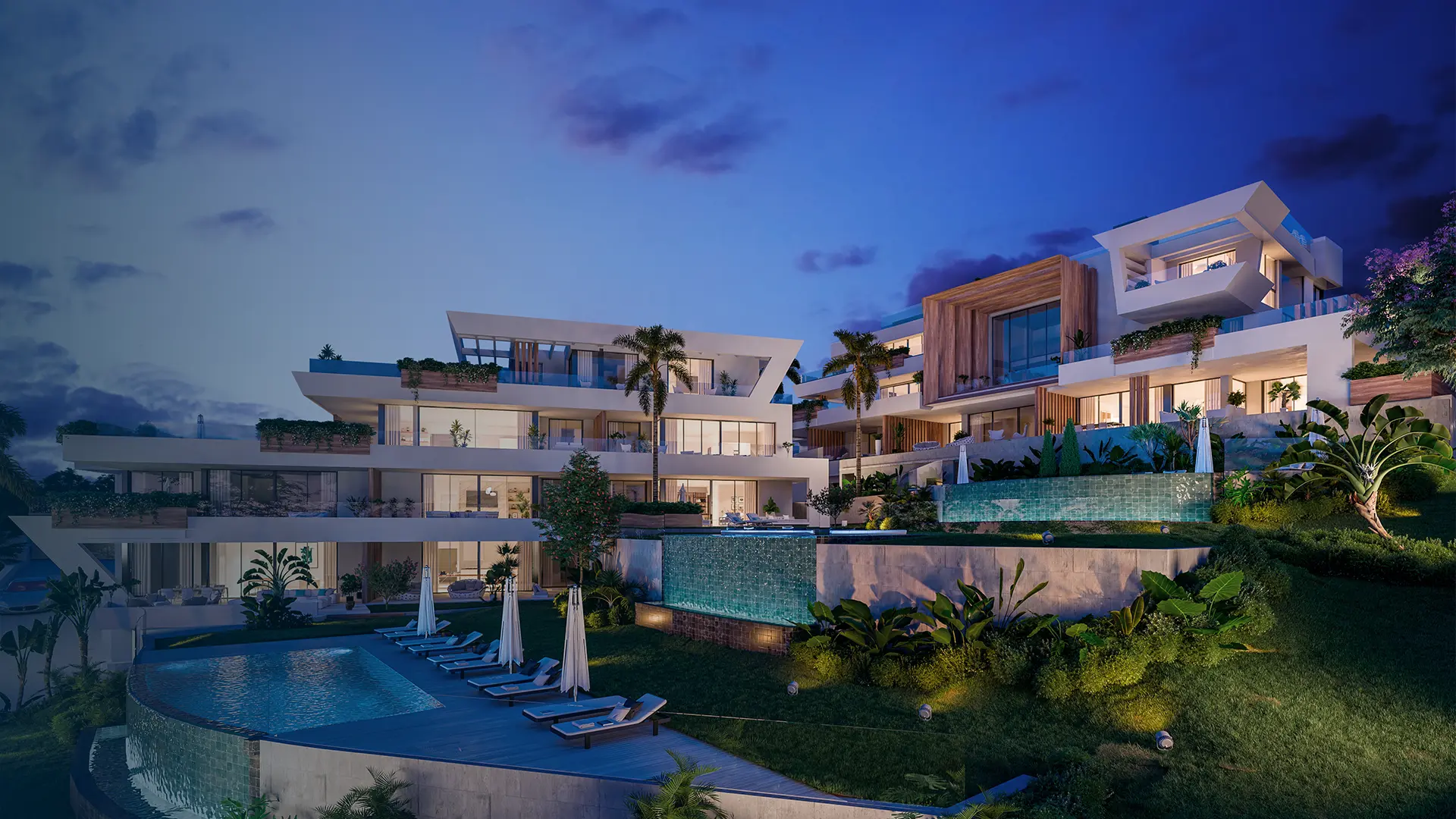 A contemporary luxury development on the Costa del Sol illuminated at dusk, Mooy Properties